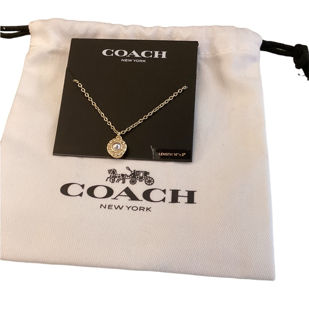 Coach Pearl Necklace , 16 inches in GoldTone. New with Original pouch